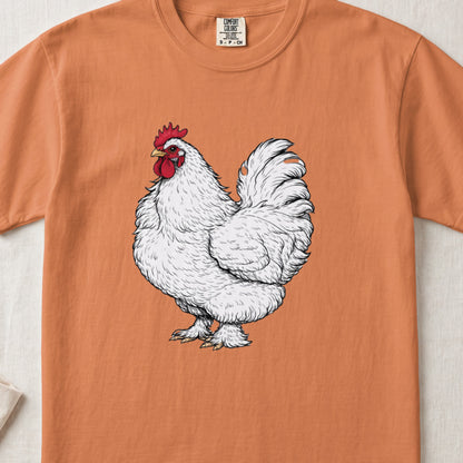 An orange crewneck t-shirt featuring a detailed illustration of a fluffy white rooster centered on the chest.