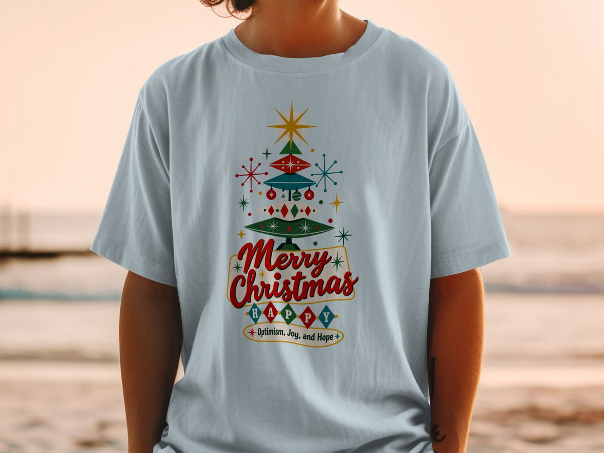 Light blue t-shirt with a retro Christmas tree design and "Merry Christmas" text.
