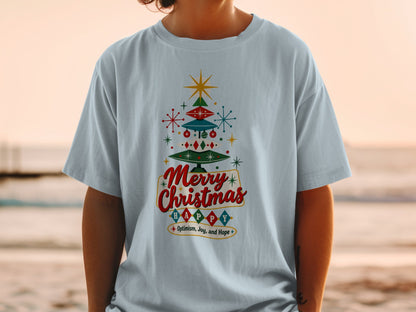 Light blue t-shirt with a retro Christmas tree design and "Merry Christmas" text.