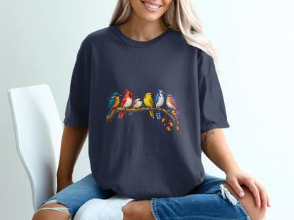 Dark blue t-shirt with a watercolor-style print of six colorful birds perched on a branch.