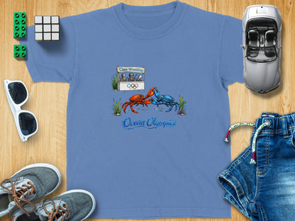 T-shirt with "Claw Wrestling Ocean Olympics" graphic featuring fighting crabs.