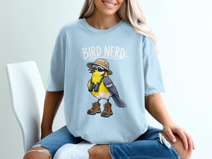 Light blue t-shirt with "BIRD NERD" text and a cartoon bird wearing a hat and binoculars.