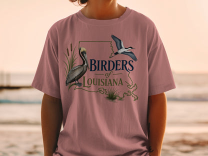 T-shirt graphic: Birders of Louisiana with pelican, flying bird, and map outline.