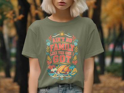 Olive green t-shirt with Thanksgiving graphic: "Ain't No Family Like The One I Got."