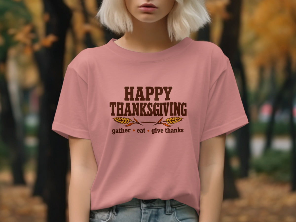 Pink t-shirt with "Happy Thanksgiving" and "gather, eat, give thanks" text.