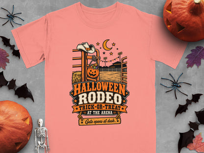 Halloween Rodeo graphic with cowboy hat, pumpkin candy bucket, and text.