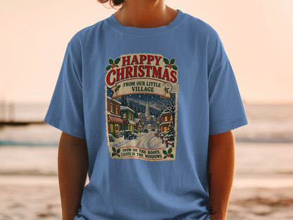 T-shirt with vintage Christmas village scene and text.