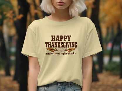 Yellow t-shirt with "Happy Thanksgiving" and "gather eat give thanks" text.