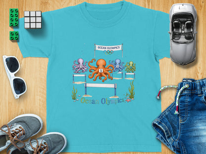 T-shirt with four numbered octopuses in a race and "Ocean Olympics" text.