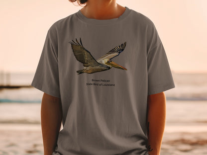 Brown Pelican, State Bird of Louisiana graphic on a gray t-shirt.