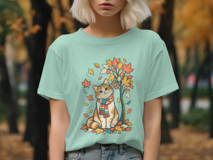 Illustration of a tabby cat wearing a scarf sitting in autumn leaves.