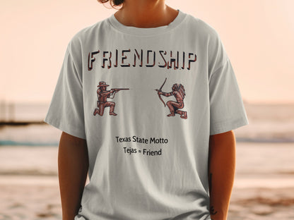 Light grey t-shirt with "FRIENDSHIP" and cartoon of a cowboy and Native American facing each other.