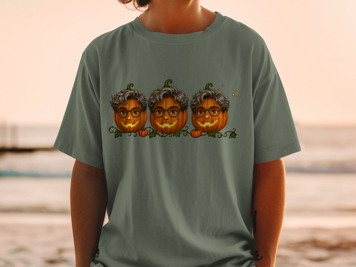 Three cartoon pumpkins with curly hair and glasses smile on a vine.