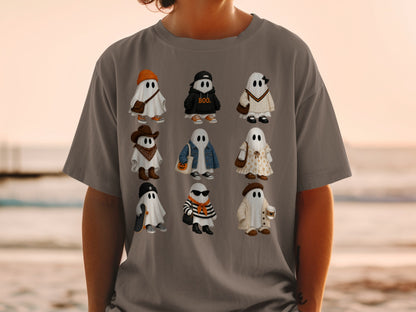Nine cartoon ghosts in various outfits are displayed on a grey t-shirt.