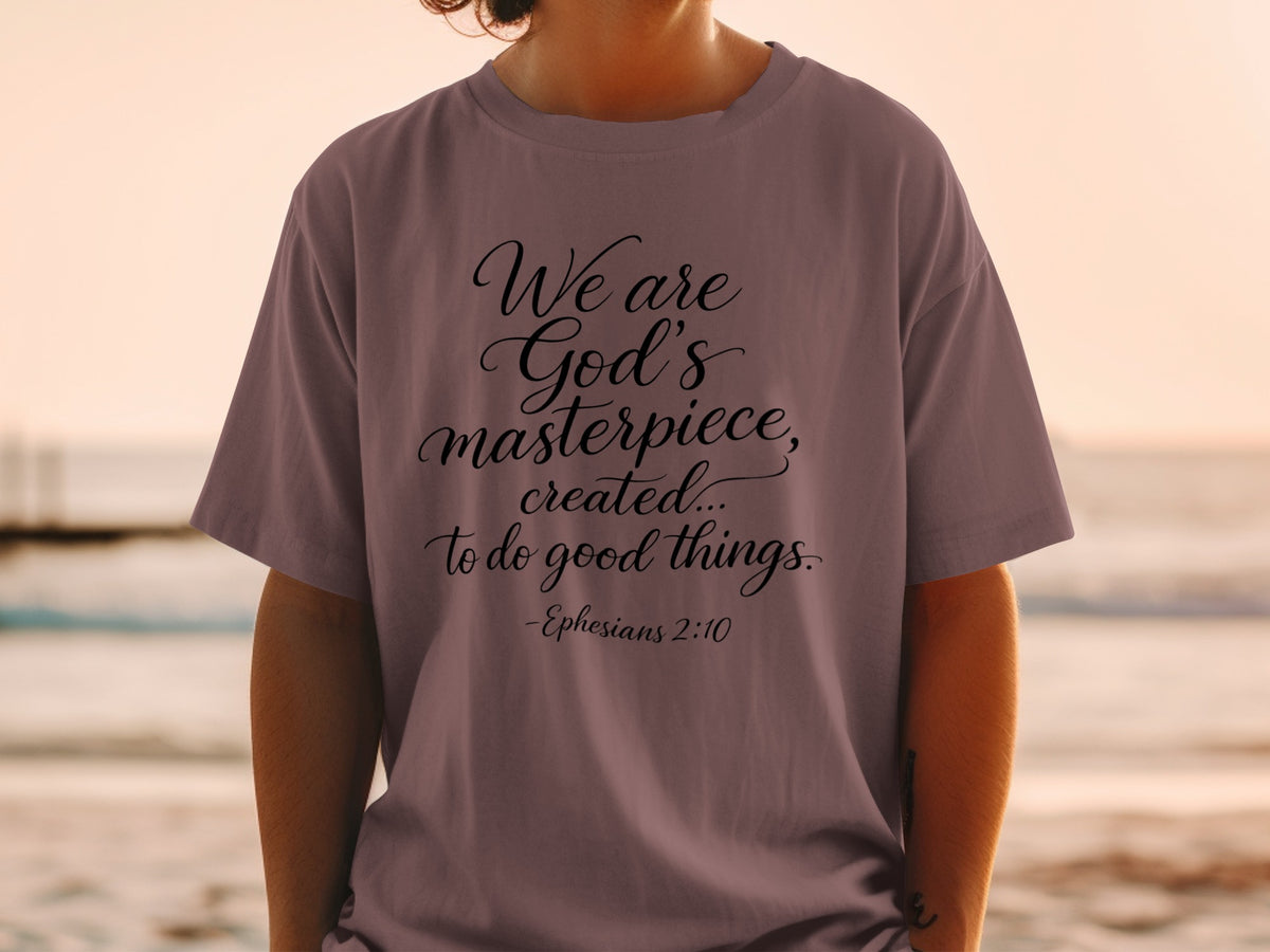 T-shirt with text "We are God's masterpiece, created... to do good things." - Ephesians 2:10.