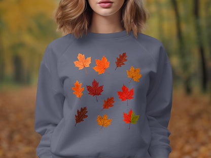 Gray sweatshirt with a pattern of colorful autumn leaves.