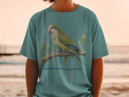Teal t-shirt with green parrot on branch and text "Birders: Seen in the Wild Yonder".