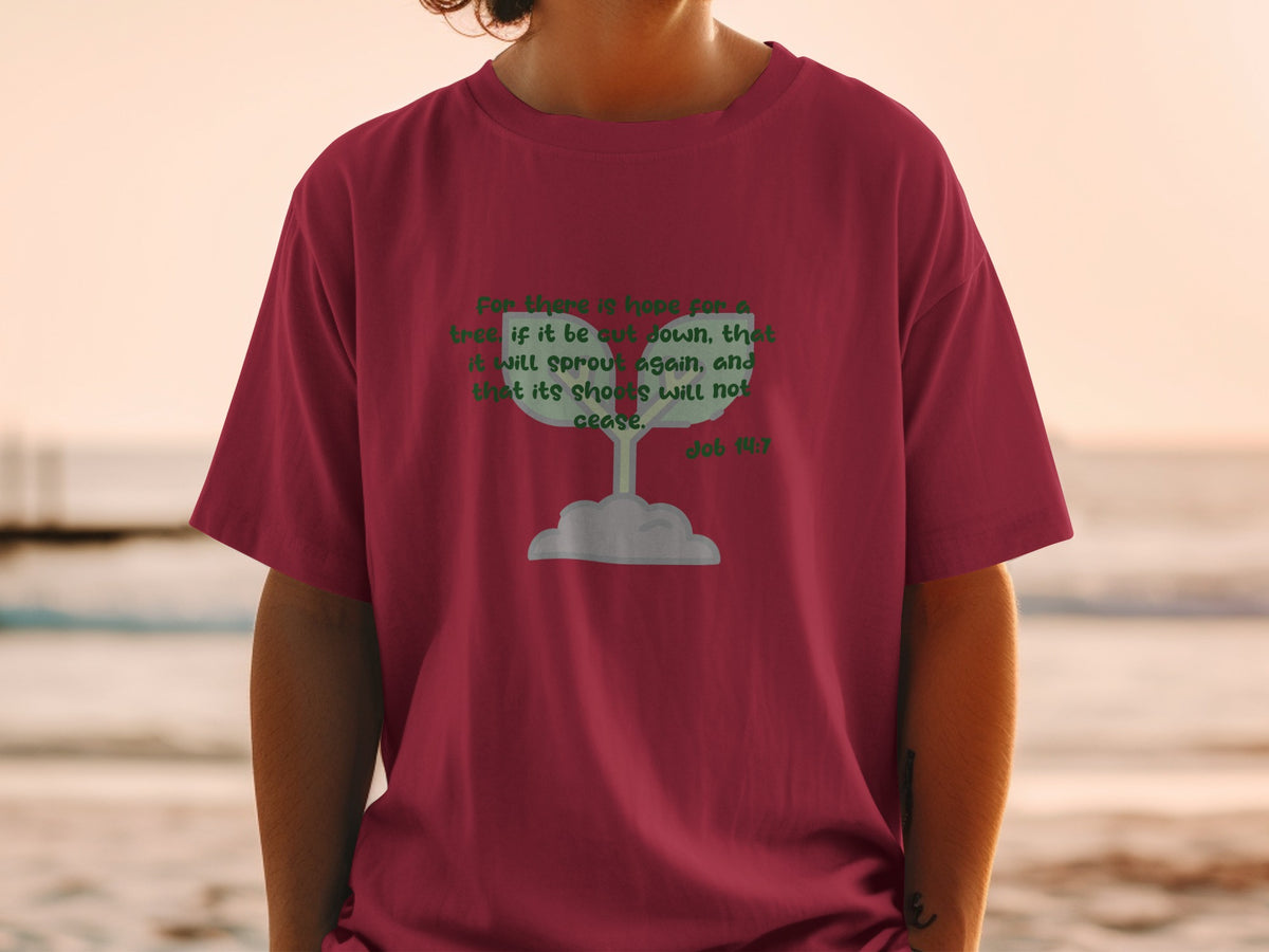 Maroon t-shirt with green text from Job 14:7 and a sprouting plant graphic.