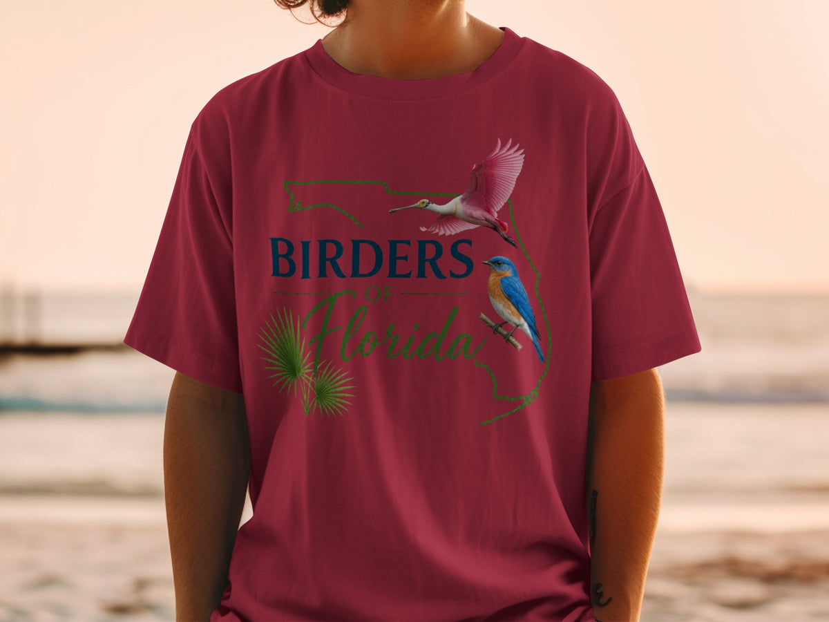 Maroon t-shirt with a Florida outline, two birds, and "Birders of Florida" text.
