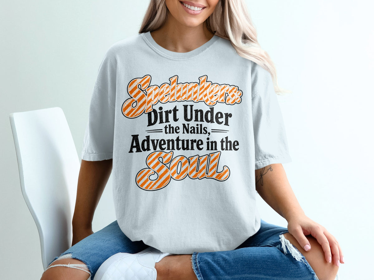 "Spelunkers Dirt Under the Nails, Adventure in the Soul" graphic t-shirt.