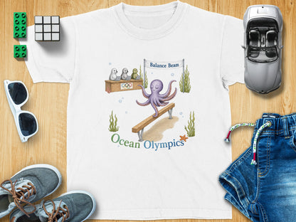 T-shirt graphic of an octopus doing gymnastics on a balance beam with seals watching.