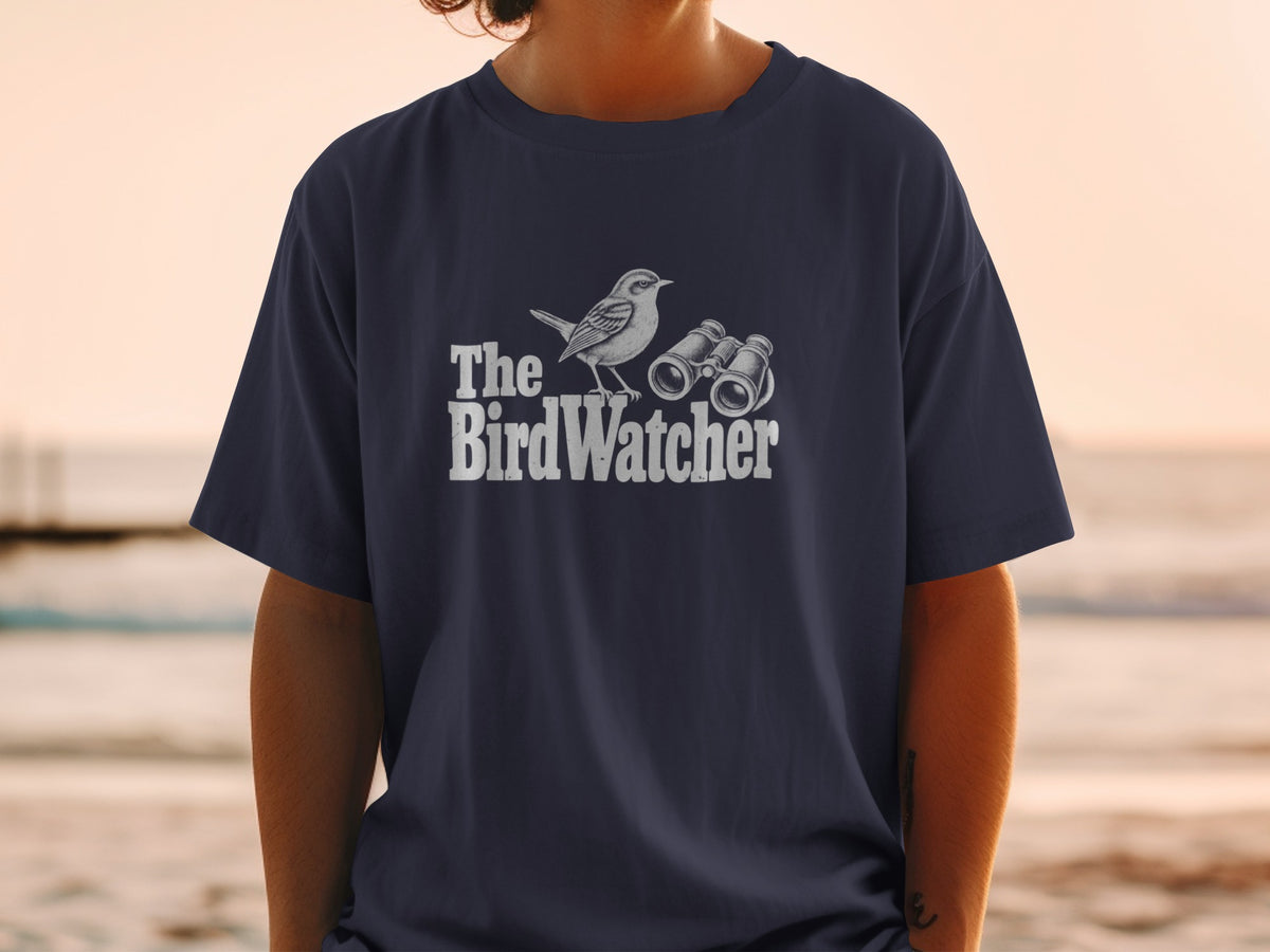 Navy t-shirt with "The BirdWatcher" text, a bird, and binoculars graphic.
