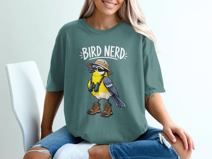 T-shirt with "Bird Nerd" text and illustration of a bird wearing a hat and binoculars.