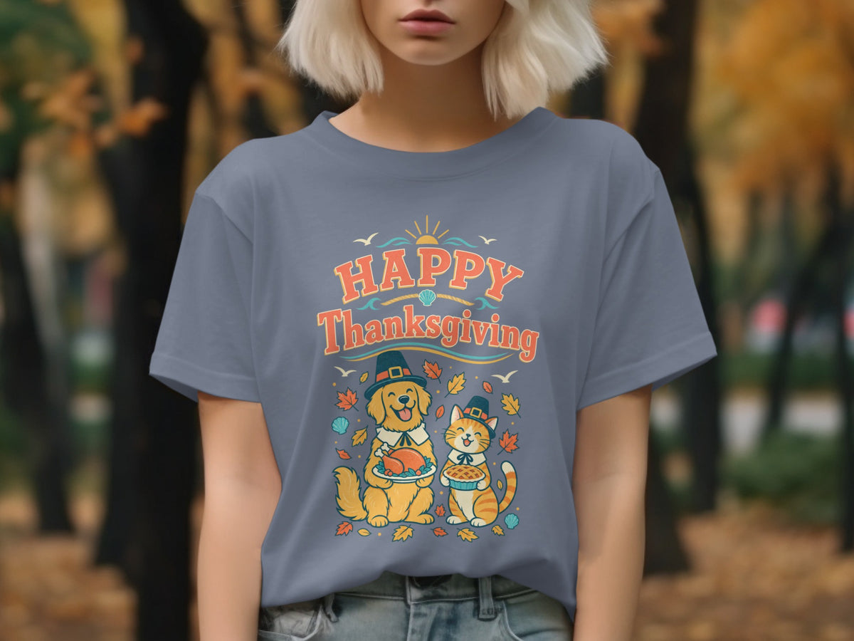 Dog and cat with pie and turkey on t-shirt reading "Happy Thanksgiving".