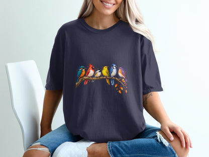 Dark t-shirt with a colorful flock of birds perched on a branch.