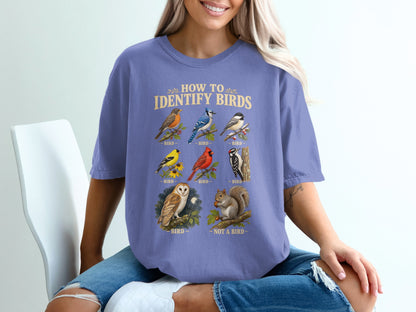 T-shirt with "How to Identify Birds" graphic showing various birds and a squirrel.