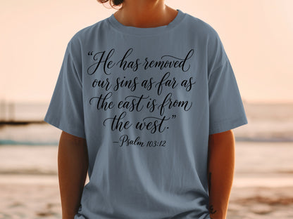 T-shirt with Bible verse "He has removed our sins as far as the east is from the west."
