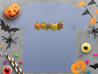Light blue t-shirt with row of five smiling pumpkins graphic.