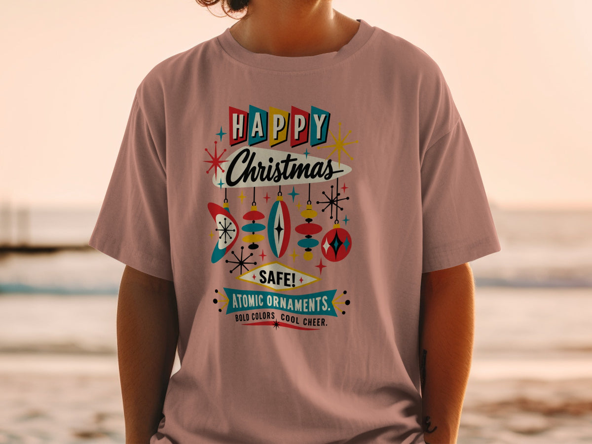 Pink t-shirt with retro "Happy Christmas Atomic Ornaments" graphic and ornament designs.
