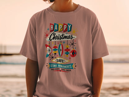 Pink t-shirt with retro "Happy Christmas Atomic Ornaments" graphic and ornament designs.