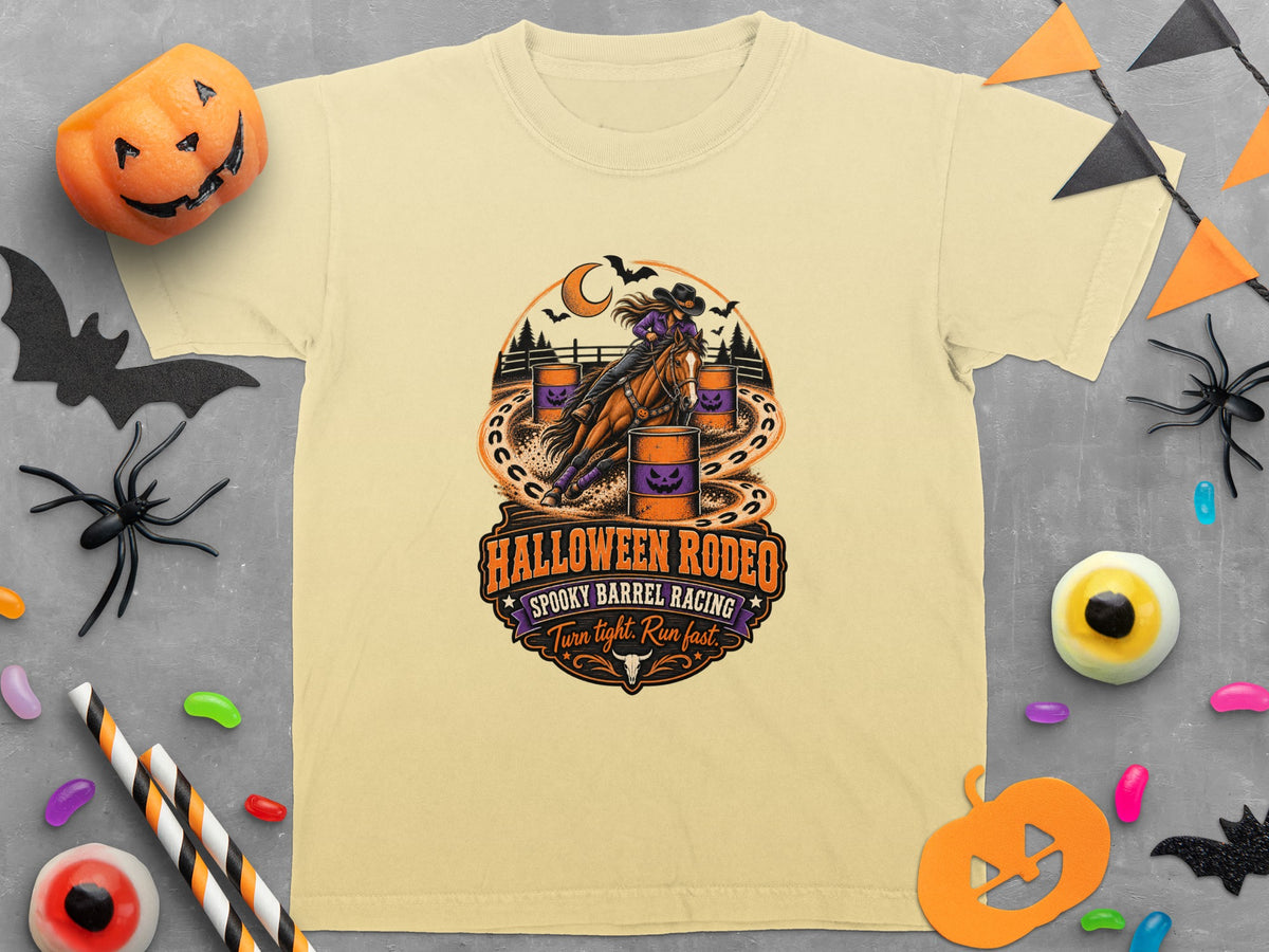 T-shirt with Halloween Rodeo graphic featuring a rider and horse racing barrels.