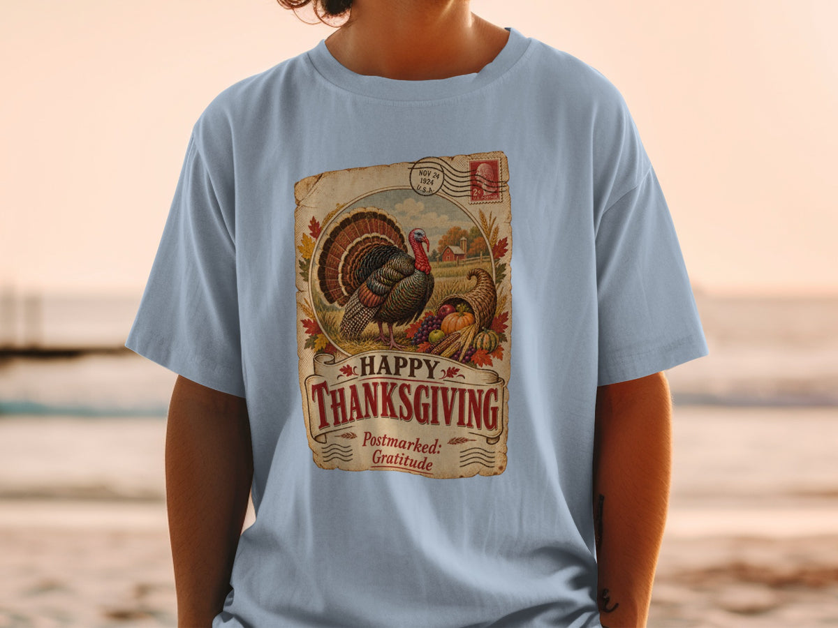 Thanksgiving t-shirt with turkey, cornucopia, and "Happy Thanksgiving" text.