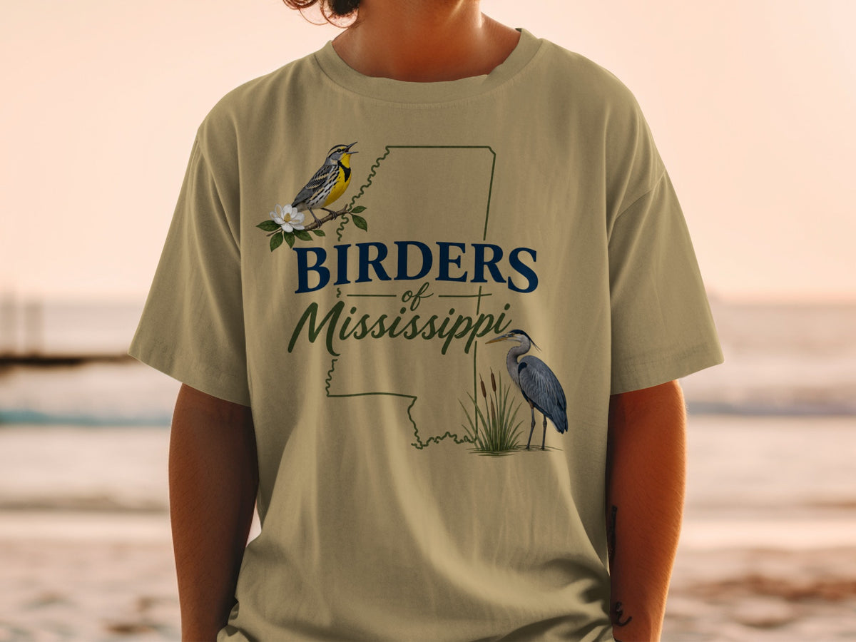 T-shirt with "Birders of Mississippi" text, a yellow bird, and a blue heron.
