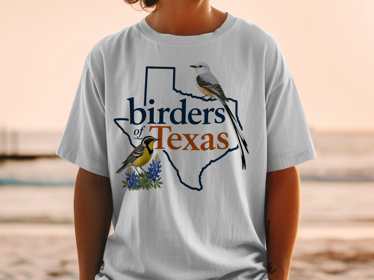 White t-shirt with "birders of Texas" text and two birds on Texas outline.