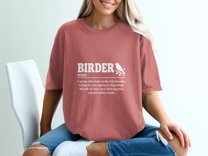 Coral t-shirt with "Birder" definition and bird graphic.