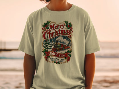 Light tan t-shirt with vintage "Merry Christmas" train graphic.