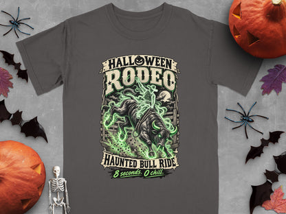 "Halloween Rodeo Haunted Bull Ride" graphic tee with cowboy on a spectral bull.