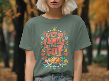 T-shirt graphic with "Ain't No Family Like The One I Got" text and Thanksgiving imagery.