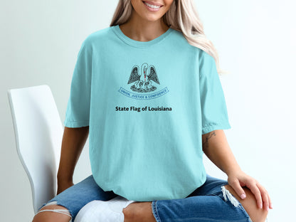 Light blue t-shirt with Louisiana state flag design and text.