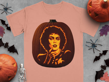 Peach-colored t-shirt featuring a carved jack-o-lantern graphic of Frank-N-Furter from The Rocky Horror Picture Show, surrounded by Halloween decorations.