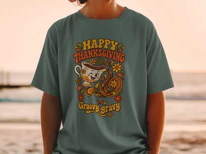Happy Thanksgiving Groovy Gravy graphic on a green t-shirt.