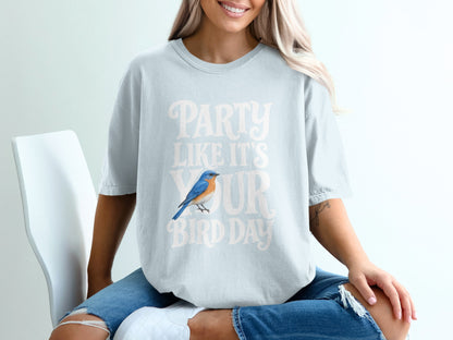 Light blue t-shirt with "Party Like It's Your Bird Day" text and a blue bird graphic.