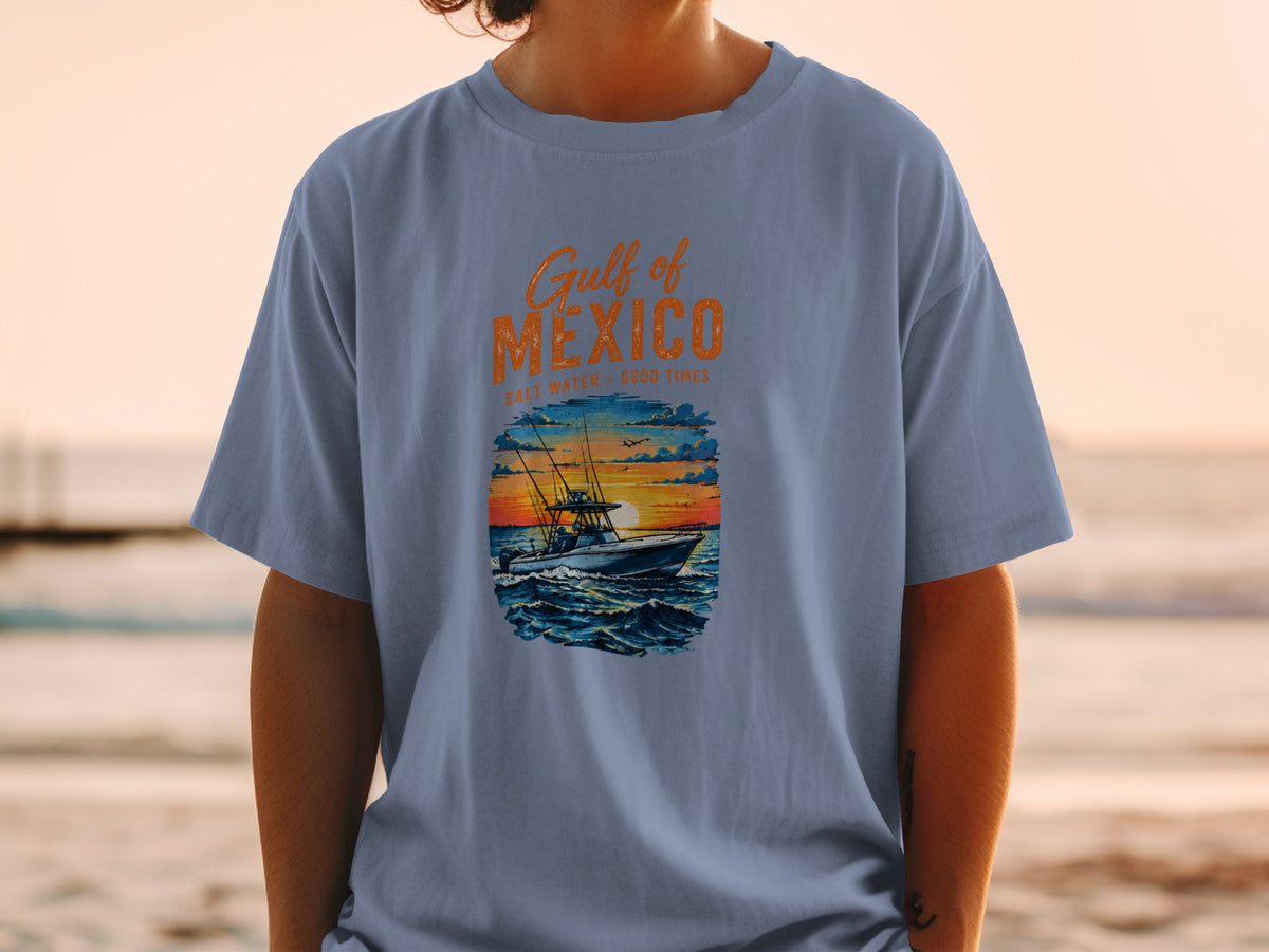 T-shirt graphic with "Gulf of Mexico" text and fishing boat at sunset.