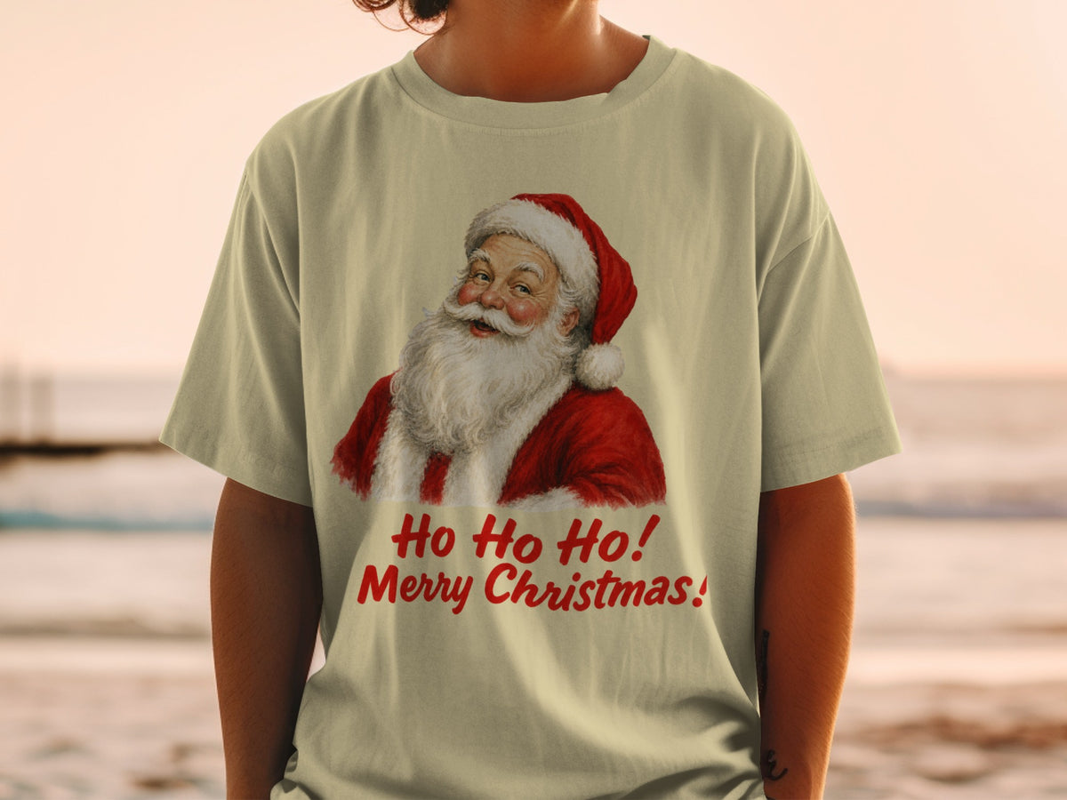 Santa Claus graphic with text "Ho Ho Ho! Merry Christmas!" on a light t-shirt.