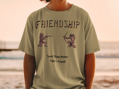 T-shirt with "FRIENDSHIP" text, cowboy and Native American figures, and "Texas State Motto Tejas = Friend".