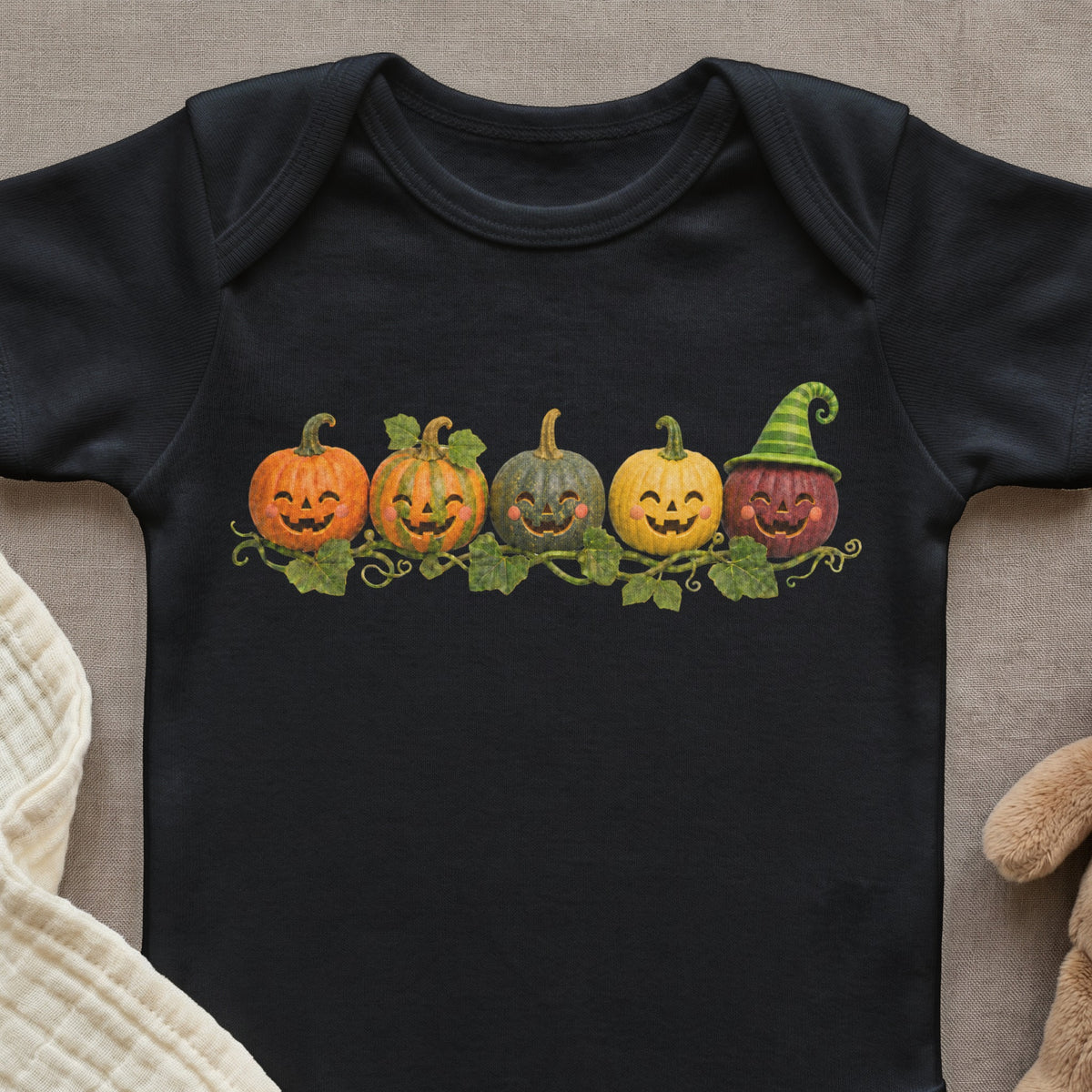 Black bodysuit with a row of cute smiling jack-o'-lanterns and vines.